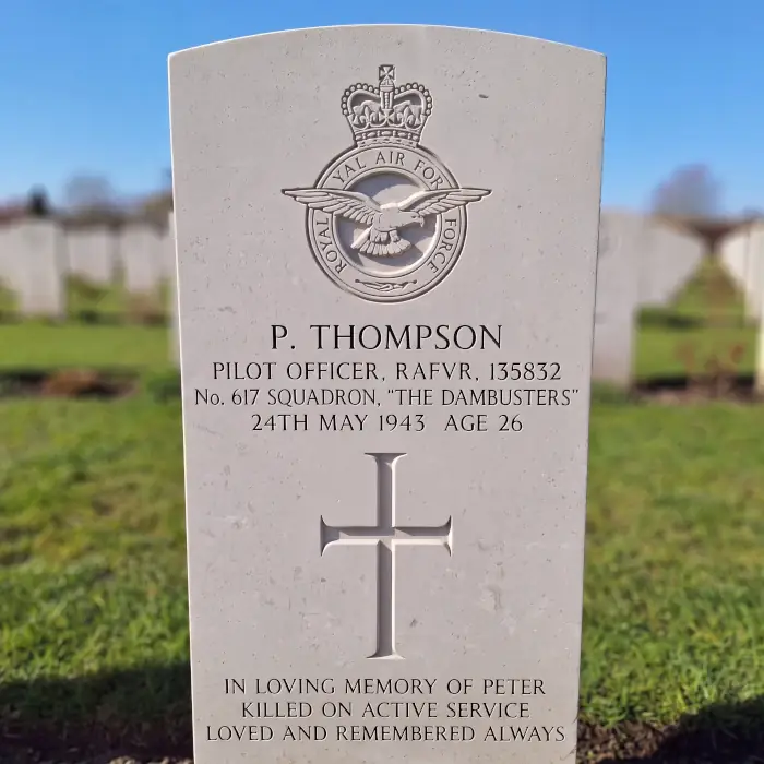 A carved stone memorial headstone featuring a precise Royal Air Force crest and text, demonstrating the flawless results achieved using our custom vector files for monument engraving and sandblasting.